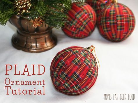 three plaid ornaments sitting on top of a table