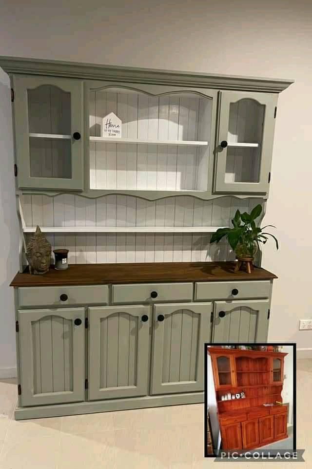 an image of a kitchen with grey cabinets