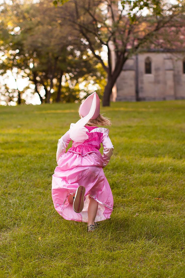 Awaken your little one's imagination when they slip on this dress and step into a fairy tale filled with romance and magical beings! Lovely two tone dress has a bright pink velvet bodice, complimented by light pink velvet sleeves Features a shimmery collar, silver trim, hot pink peplum Two tone china silk skirt skirt with silver swirl pattern printed on the inset Breathable, Silky Soft, 100% Polyester Fabrics Accessories Sold Separately **Size Small Does Not Include Gem ⚠️WARNING: CHOKING HAZARD Pink Fairytale Dress For Fancy Dress Occasions, Pink Ruffled Dress For Costume, Pink Ruffled Dresses For Costumes, Pink Whimsical Dress For Fancy Dress, Pink Fitted Fairy Dress For Fancy Dress, Whimsical Pink Fairy Dress For Fancy Dress, Pink Fitted Fairytale Fairy Dress, Pink Princess Style Dress For Costume Party, Whimsical Pink Fancy Dress