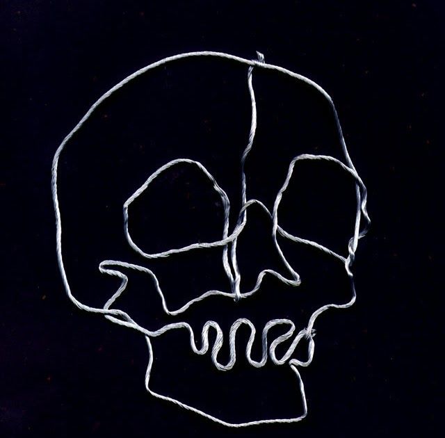 a drawing of a skull with the word bones written in white on a black background