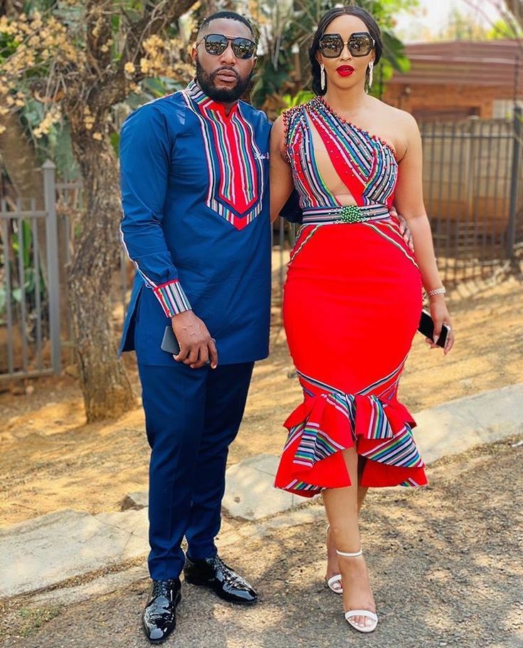 looking for couple outfit ideas? this couple outfit is a must try ankara couple outfit ideas. if you want more ankara couple style inspiration then click on the link below. #ankarastyle #ankaracouple #ankaracouplestyle #africancouple #africancouplestyle Venda Traditional Attire, Zulu Traditional Attire, Matching Outfits For Couples, Outfits For Couples, Couples African Outfits, South African Traditional Dresses, African Traditional Wear, African Traditional Wedding Dress, African Wedding Attire