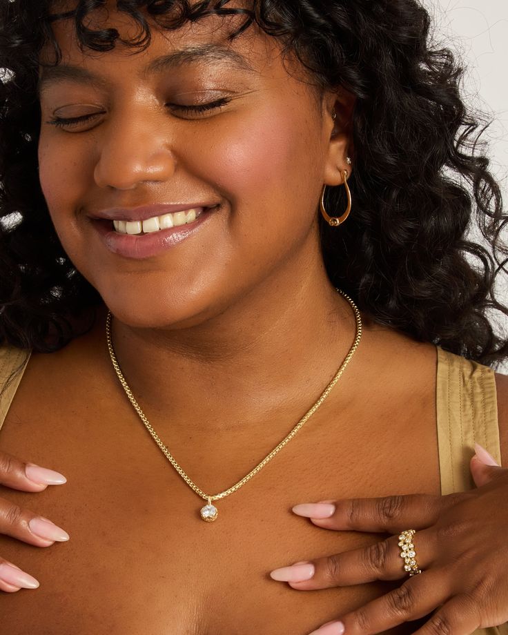 Crafted in 14K solid gold, the Princess Stone Pendant features a faceted white zircon stone encircled by intricate petroglyphs. Its unique design adds a touch of elegance to any outfit, and pairs wonderfully with our Princess Petroglyph Stone Studs. Metal: 14K solid gold Stone: White zircon Dimensions: 16mm x 8mm Stone Size: 8mm Style #: GP160Z Heirloom Yellow Gold Jewelry In Recycled Gold, Gold Heirloom Jewelry For Everyday Wear, Everyday Heirloom Jewelry With Vvs Clarity, Gold Moissanite Gemstone Necklace, Heirloom Style Everyday Gold Jewelry, Everyday Heirloom Gold Jewelry, Heirloom Recycled Gold Round Jewelry, Heirloom Style Recycled Gold Jewelry, Everyday Diamond Oval Jewelry