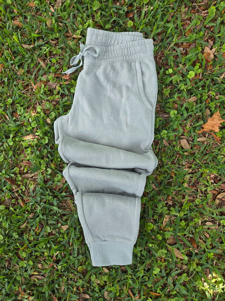 Expertly crafted for women, these Mineral Washed Jogger Sweatpants feature a soft, luxurious mineral wash in a soothing sage color. These joggers are perfect for lounging or running errands, giving you both comfort and style in one. Upgrade your wardrobe with these must-have sweatpants. Functional Solid Color Moisture-wicking Sweatpants, Sportswear Sweatpants With 4-way Stretch And Comfort Waistband, Soft-washed Cotton Sweatpants, Sportswear Joggers With 4-way Stretch And Comfort Waistband, Sporty Gray Moisture-wicking Sweatpants, Sage Color, Jogger Sweatpants, Running Errands, Must Haves