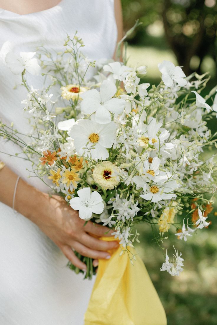 Yellow wildflowers, bridal bouquet, wildflower bouquet Wispy Wedding Bouquet, Small White Wildflower Bouquet, Wildflower Greenery Bouquet, Sage Green And Wildflowers Wedding, Garden Wedding Bouquet Spring, Eucalyptus Wildflower Bouquet, Wedding Bouquet October, Delicate Wedding Flowers, Dandelion Wedding Bouquet