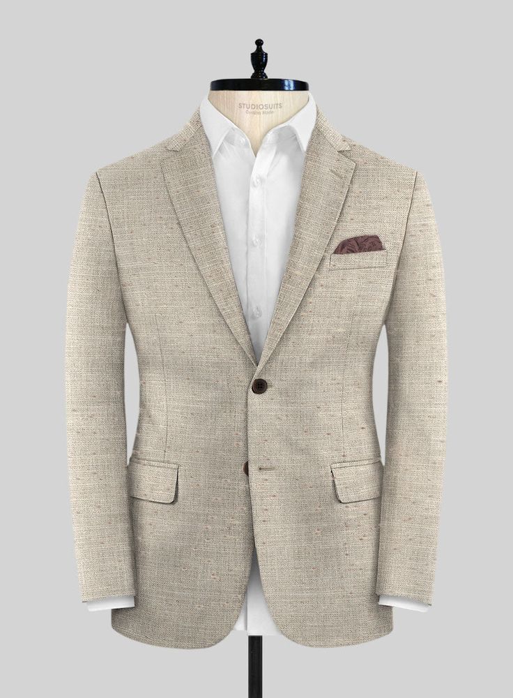 Embrace a classy aura with the Loro Piana Gemma Wool Silk Linen Suit, a luxurious and high-end addition to any man's wardrobe. Bespoke with premium materials including wool, silk, and linen, it offers a perfect balance of style, comfort, and quality. Its fabric is soft, breathable, and flows beautifully on the body. The color is a versatile and perennial shade of beige. With such a suit, you are guaranteed to look sharp and polished. Its elegance is matched only by its versatility and lasting appeal, making it a great choice for a formal event, business meeting, or special celebration.    A marriage of elegance and comfort, Loro Piana fabrics are made using the highest quality raw materials in the world, in their purest form or blended together. A sophisticated response to the dictates of Luxury Linen Tweed Jacket With Notch Lapel, Luxury Linen Tweed Jacket For Business, Luxury Linen Business Tweed Jacket, Tailored Luxury Linen Blazer, Luxury Beige Blazer With Pressed Crease, Luxury Tailored Linen Blazer, Luxury Linen Tweed Jacket For Business Casual, Elegant Linen Tweed Jacket For Semi-formal Occasions, Elegant Semi-formal Linen Tweed Jacket