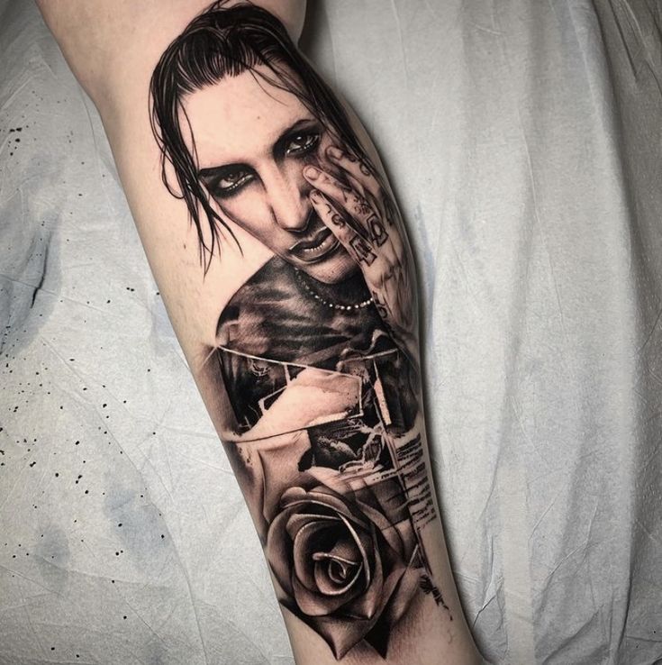 a man with a black rose tattoo on his arm