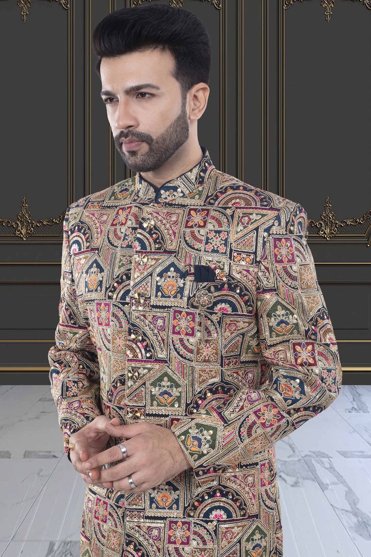 This multi-color sherwani for men is a versatile addition to any wardrobe. Crafted with precision, its unique design showcases expert tailoring and a blend of vibrant colors, making it perfect for any occasion. Express your personal style with confidence and make a statement wherever you go. Designer Long Sleeve Sherwani For Festive Occasion, Designer Long Sleeve Bandhgala For Diwali, Designer Long Sleeve Sherwani For Festivals, Designer Bandhgala With Zari Work And Long Sleeves, Designer Long Sleeve Bandhgala With Zari Work, Designer Unstitched Bandhgala For Designer Wear, Designer Nehru Jacket With Long Sleeves For Diwali, Designer Nehru Jacket With Resham Embroidery, Designer Long Sleeve Nehru Jacket For Diwali