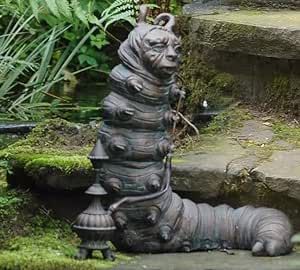 a statue of a bear sitting on top of some rocks