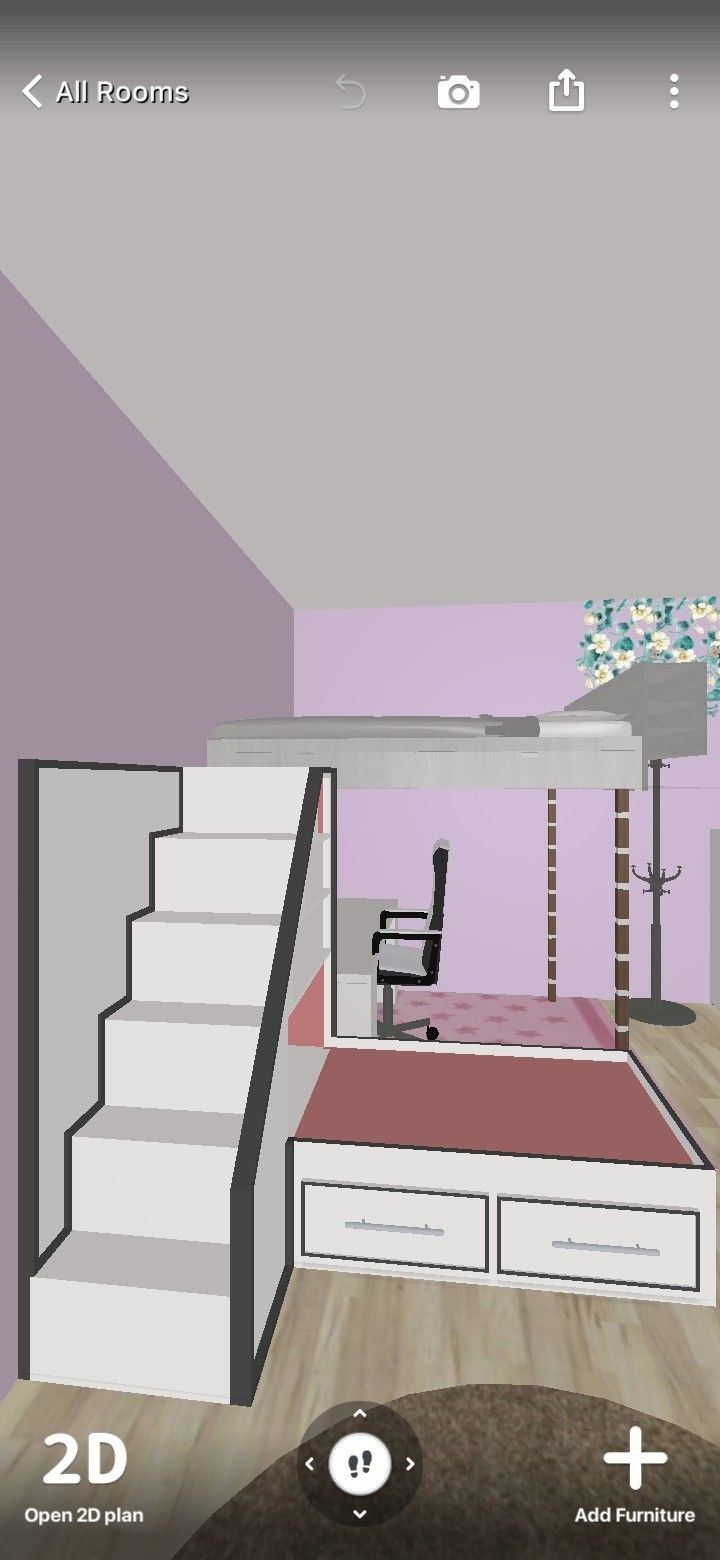 a virtual view of a living room with stairs leading up to the bed and desk