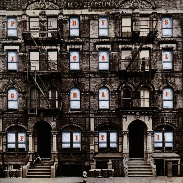 an old building with many windows and stairs