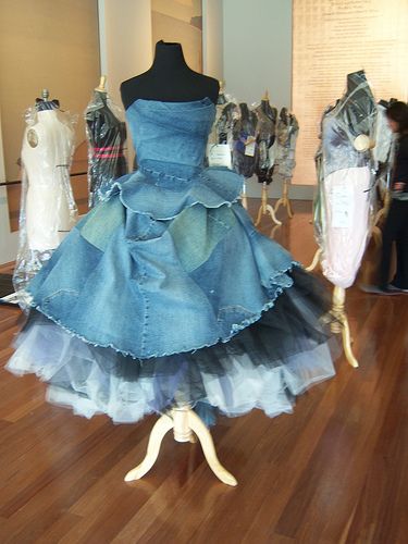 there is a blue dress on display in the room