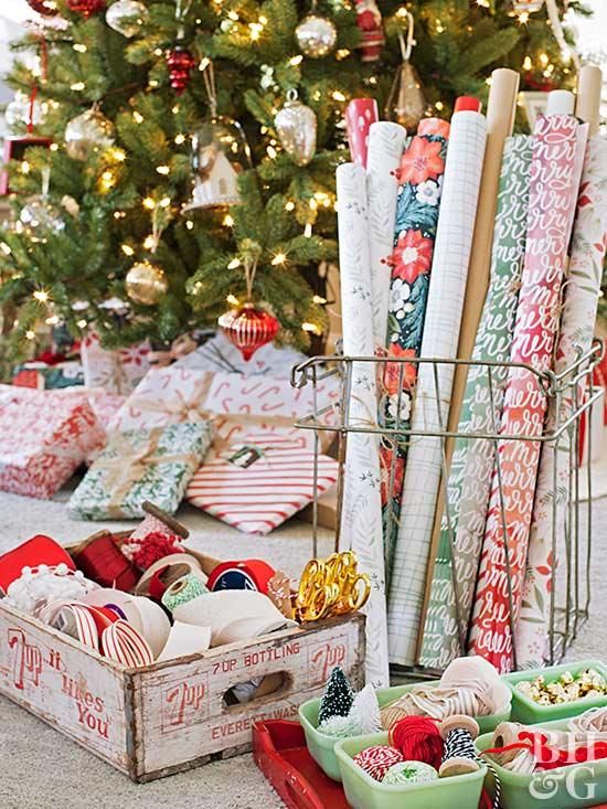 a christmas tree with presents in front of it and many wrapped gifts on the floor