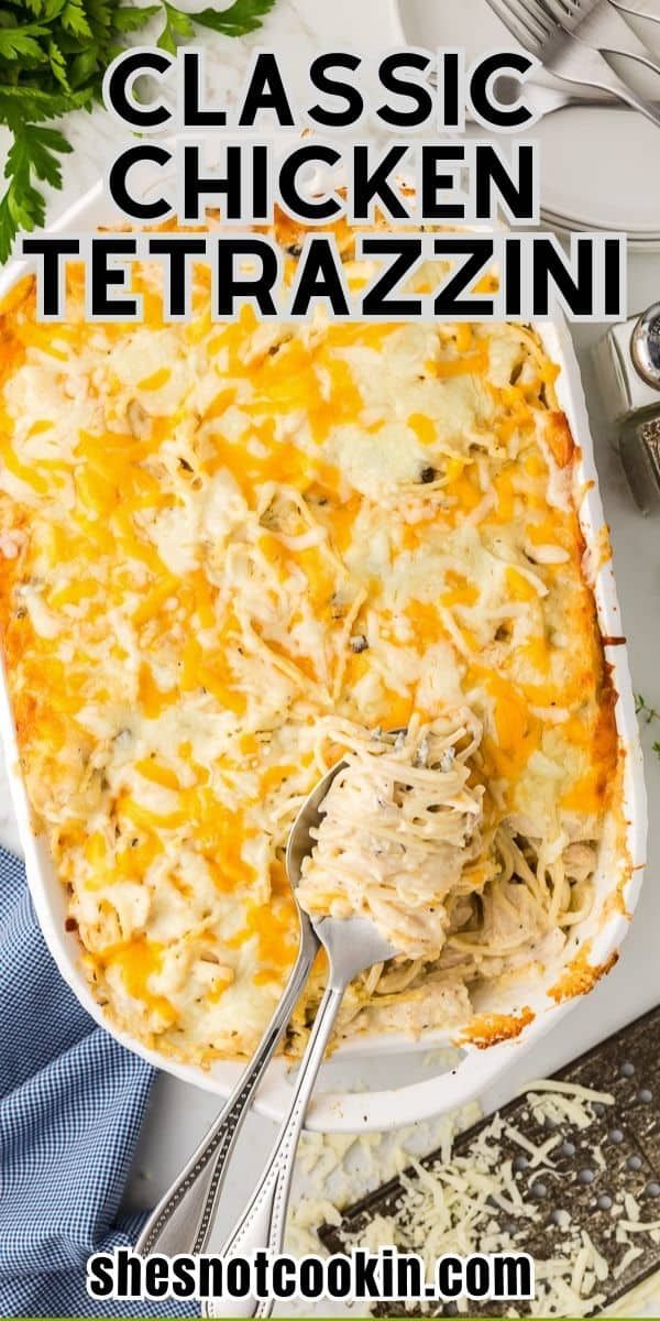 a casserole dish with chicken and cheese in it on a white platter