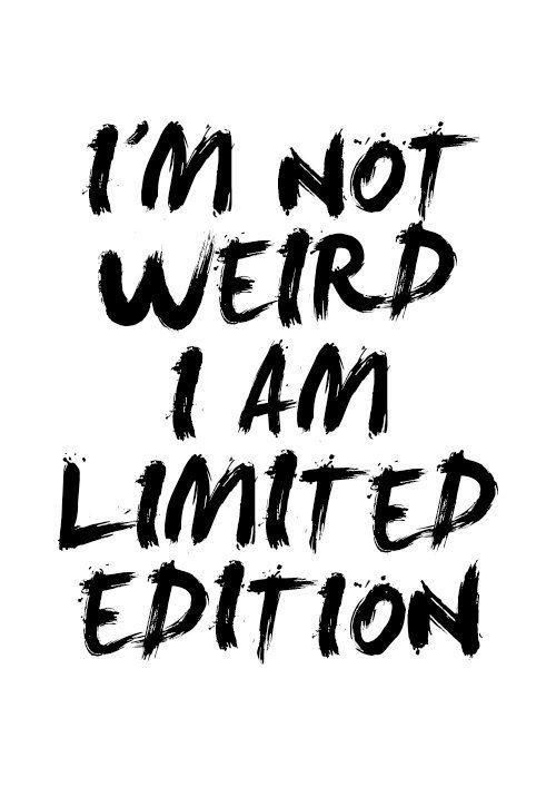 the words i'm not weird i am limited edition are painted on white paper