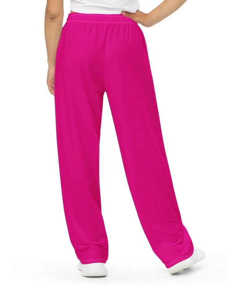 Get the comfort of pajamas in this stylish pair of wide-leg pants. With the adjustable waist and stretchy fabric, it’s like your favorite sweatpants but better. • Relaxed unisex fit • Practical side pockets • Elastic waistband with a white drawstring • Can be worn on the waist or on the hips • Premium knit mid-weight jersey fabric • 95% polyester, 5% elastane This product is made especially for you as soon as you place an order, which is why it takes us a bit longer to deliver it to you. Making Solid Straight Leg Harem Pants For Loungewear, Comfortable Straight Leg Harem Pants For Loungewear, Casual Full-length Sweatpants For Yoga, Casual Full-length Yoga Sweatpants, Leisure Full-length Pants With Comfort Waistband, Pink Wide Leg Athleisure Sweatpants, Pink Wide Leg Sweatpants Athleisure Style, Baggy Sweatpants With Elastic Waistband For Lounging, Leisure Wide Leg Harem Pants With Elastic Waistband