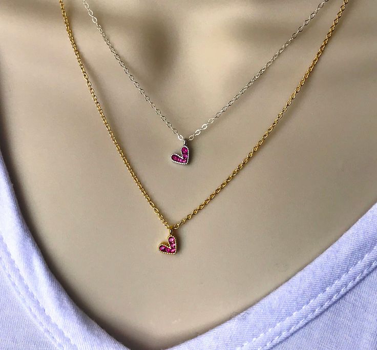 *handmade item *gold necklace:  all materials are 14 karat  gold filled, high quality chain and parts.   Pink stones are beautiful colored cubic  zirconia crystals  *silver necklace:  all materials are sterling  silver except charm which is high quality  white gold filled.  Pink stones are beautiful  colored cubic zirconia crystals  *necklaces adjustable from 16 to 18 inches Pink Heart Charm Necklace In Cubic Zirconia, Pink Cubic Zirconia Heart Charm Necklace, Pink Heart Pendant Dainty Jewelry, Pink Sterling Silver Jewelry With Delicate Chain, Pink Heart-shaped Gold Plated Necklace, Pink Gold Heart-shaped Cubic Zirconia Jewelry, Dainty Pink Heart Pendant Jewelry, Pink Gold Plated Necklace For Anniversary, Valentine's Day Pink Gold Jewelry With Cubic Zirconia