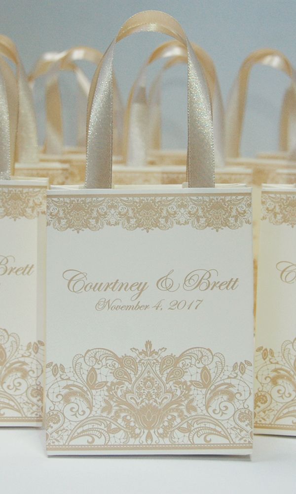 wedding favors are lined up in small bags