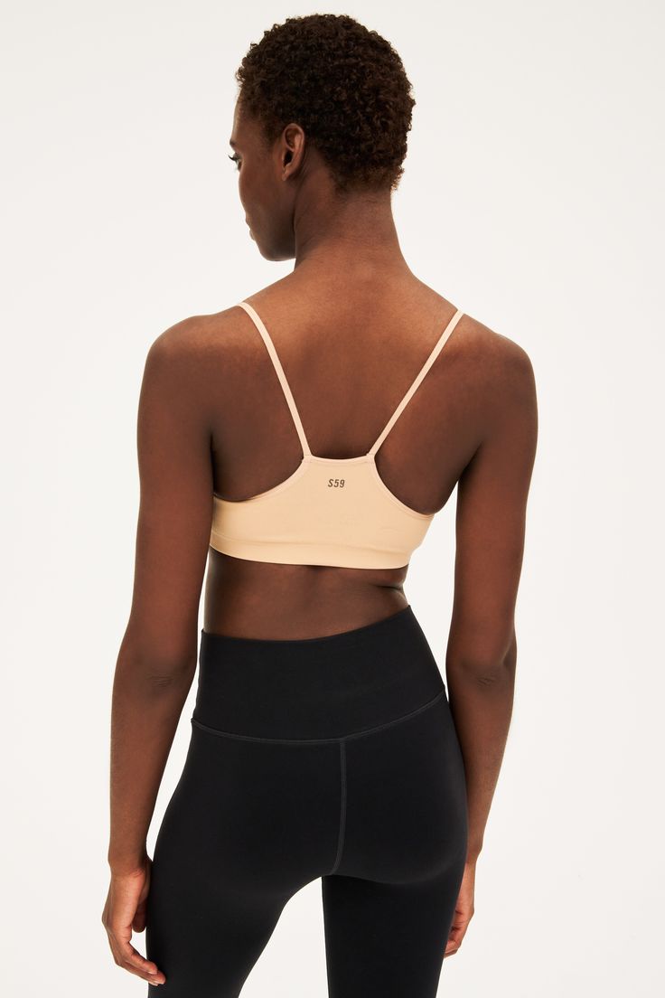 An easy to wear seamless bra designed to go from gym to everyday...seamlessly. Chafe-free fabric lets you move with easy and layers beautifully under any top. BEST FOR: running, yoga, crossfit, barre, pilates, spin class or gym workouts. Model is 5'10" and wears a size XS/S. Light Support Stretch Sports Bra, Versatile Light Support Sports Bra, Versatile High Stretch Sports Bra For Light Exercise, Functional Compressive Crop Top With Built-in Bra, Functional Crop Top With Built-in Bra For Pilates, Yoga Crop Top With Built-in Bra And Medium Support, Yoga Crop Top With Built-in Bra, Functional Yoga Sports Bra With Built-in Bra, Gym Activewear With Built-in Bra And Minimal Stretch