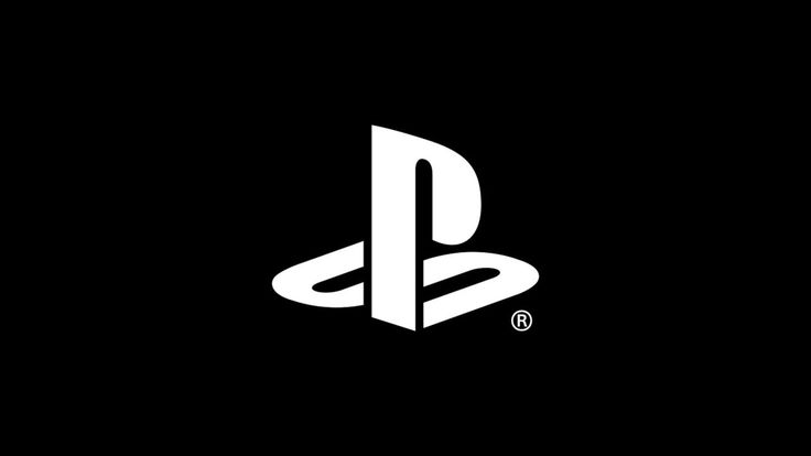 the playstation logo in black and white on a dark background, with an oval shaped object at the center