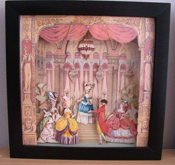 this is an image of a paper cutout of princesses and their babies on stage