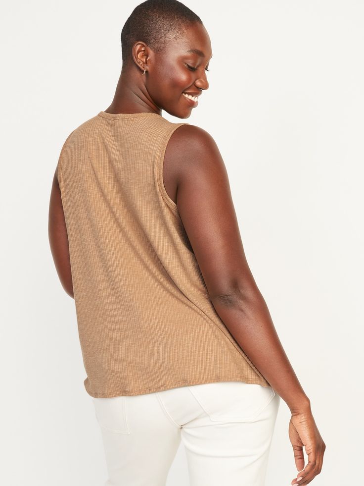 Our Luxe tank tops are supremely soft and drape beautifully.  You deserve it  Crew neck.  Sleeveless arm openings.  Rib-knit, with comfortable stretch.  Swing silhouette.  @modelsizes 5’9":S | 5'7":L | 5'10":XL @modelsizes BodEquality means size eq Beige Crochet Tank Top, Summer Brown Crew Neck Tank Top, Brown Crew Neck Tank Top For Summer, Versatile High Neck Tank Top For Spring, Versatile Sleeveless Tank Top For Fall, Beige Sleeveless Casual Tank Top, Trendy Brown Sleeveless Tank Top, Casual Beige Sleeveless Tank Top, Casual High Neck Vest For Spring