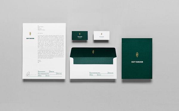 the stationery is neatly organized and ready to be used for business cards, envelopes, and letterheads