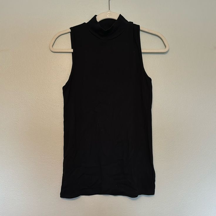 Brand New Gap Nock Neck Tank. Size Small, Black Black Turtleneck Tank Top For Spring, Spring Black High Neck Tank Top, Black High Neck Tank Top For Spring, Gap Black Summer Top, Black Gap Top For Summer, Black Turtleneck Tank Top For Fall, Spring Black Tops By Gap, Trendy Fitted Tank Top By Gap, Trendy Fitted Gap Tank Top