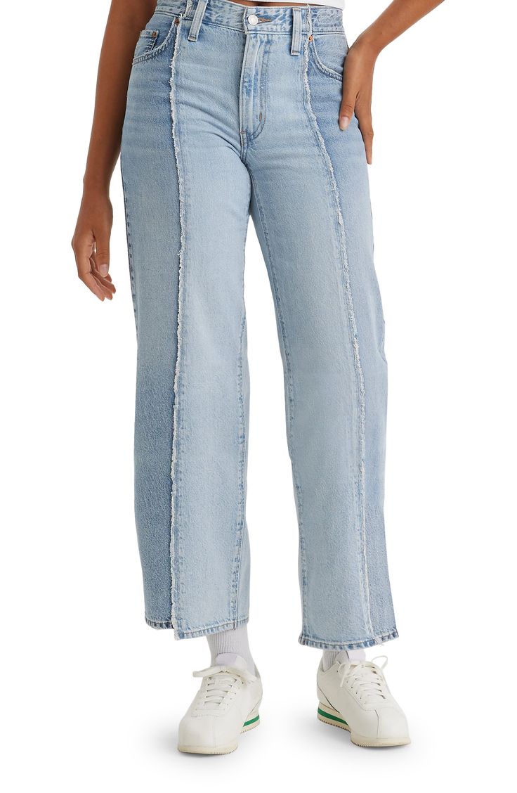 Inspired by '90s dad jeans, this extraroomy pair is made from nonstretch denim with raw-cropped hems and two-tone patchwork construction. 18 1/2" leg opening; 10 3/4" front rise; 15" back rise Zip fly with button closure Five-pocket style 100% cotton Machine wash, tumble dry Imported Streetwear Cropped Jeans With Frayed Hem, Trendy Levi's Rigid Denim Bottoms, Levi's Wide Leg Denim Flare Jeans, Levi's Wide Leg Rigid Denim Jeans, Cotton Mom Fit Cropped Jeans With Five Pockets, Cropped Denim Pants With Frayed Hem, Levi's Wide Leg Rigid Denim Bottoms, Levi's Light Wash Rigid Denim Jeans, Levi's Relaxed Fit Wide Leg Jeans