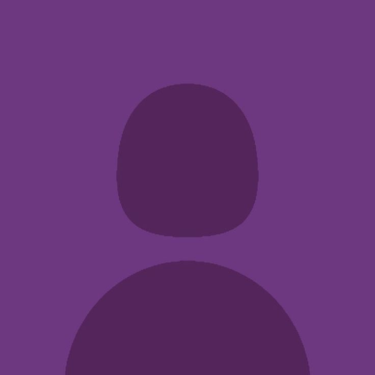 an image of a person's face in the middle of a dark purple background