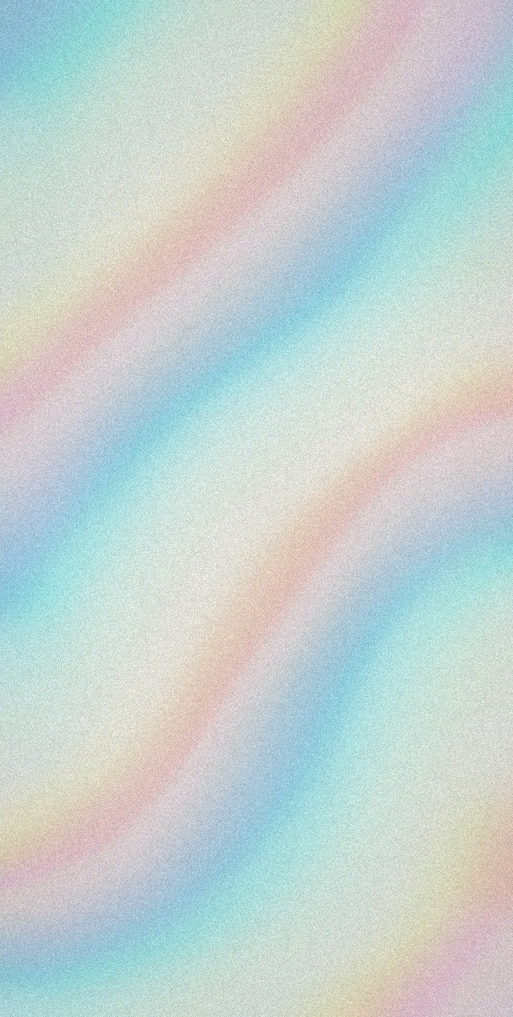 a blurry image of an airplane flying in the sky with rainbow colors on it