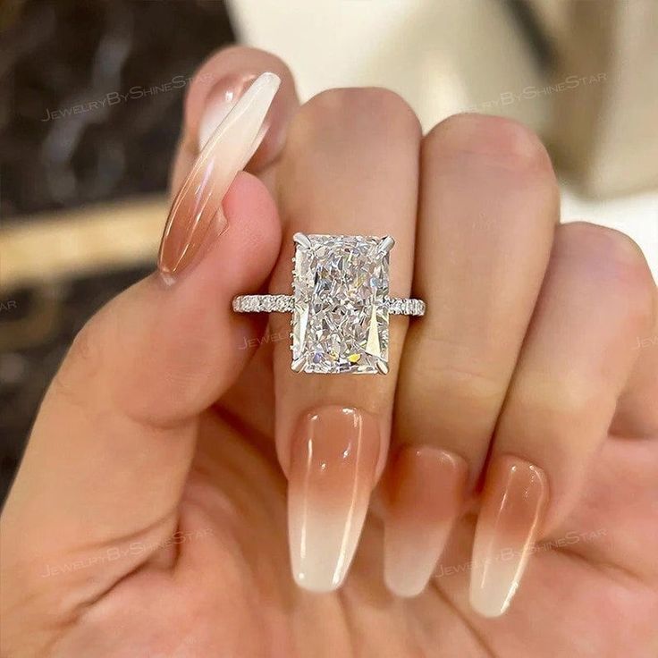 4.50 CT Certified Radiant Cut Lab Grown Diamond Engagement Ring-Hidden Halo Wedding Ring-Anniversary Gift For Her-18K White Gold Ring  ✥ 𝐌𝐚𝐢𝐧 𝐒𝐭𝐨𝐧𝐞 𝐃𝐞𝐭𝐚𝐢𝐥𝐬 ↣ Center Stone Certification: IGI ↣ Center Diamond Shape: Radiant Cut ↣ Center Diamond Weight: 4.50 Ct (App.) ↣ Color: G ↣ Clarity: VS1  ↣ Side Stone Shape: Round Cut ↣ Side Stone Weight: 0.35 CT ↣ Making Process: Handmade - Crafted by our experienced team ↣ Options: Lab Grown Diamond and Natural Diamond (Possible on request while placing an order and Extra Chargeable Service) ✥ 𝐑𝐢𝐧𝐠 𝐃𝐞𝐭𝐚𝐢𝐥𝐬 ↣ Metal Option: Solid Gold (10K, 14K, 18K), 950 Platinum ↣ Metal Finish: Yellow, White, Rose ↣ Stamp/Hallmark: Yes ↣ Metal Report: Yes ❃ Jewelry By Shine Star Services → Customised/Personalised Handmade jewellery → 80+ ant Elongated Radiant, Radiant Cut Moissanite Engagement Ring, Radiant Cut Rings, Lab Created Diamond Rings Engagement, Fav Products, Pink Engagement Ring, Radiant Cut Engagement Rings, Split Shank Engagement Rings, Future Engagement Rings