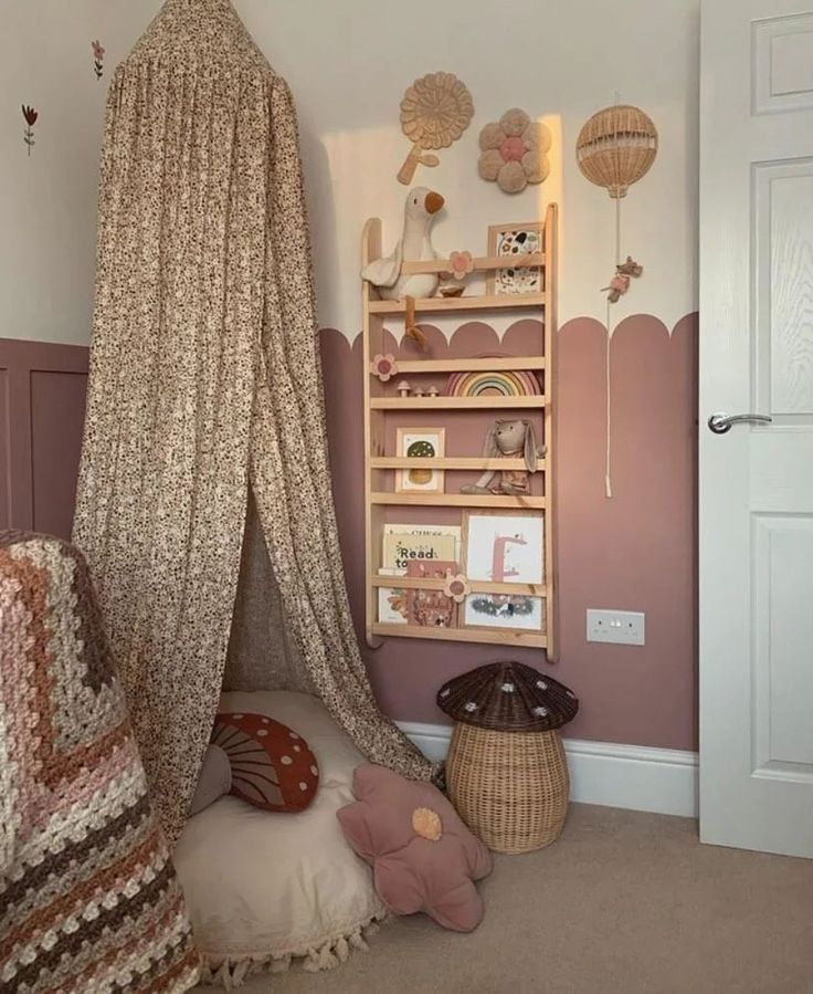 a child's bedroom with a canopy bed and bookshelf in the corner