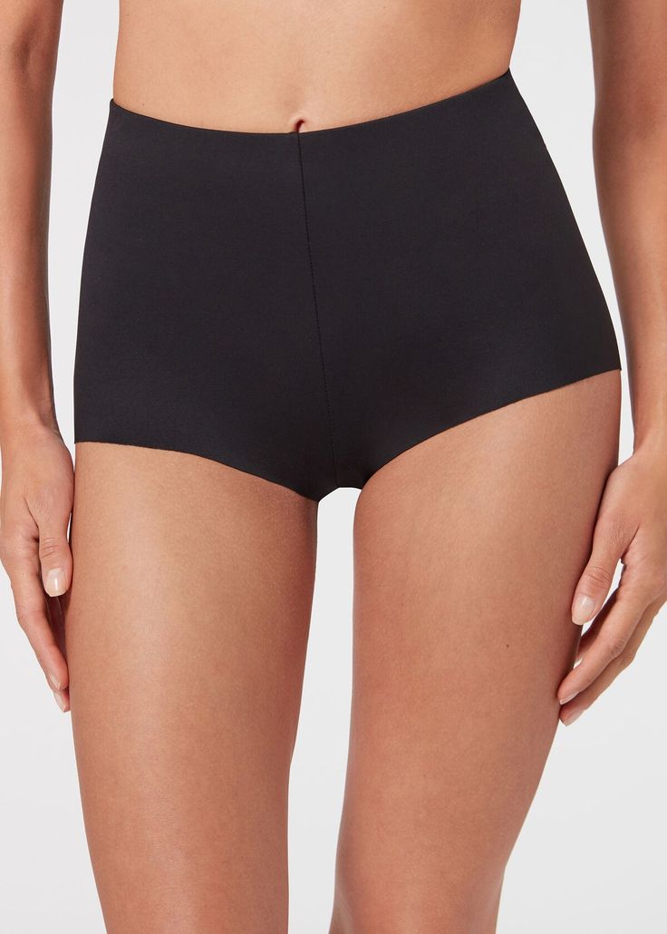 Stretch Hot Pants - Jumpsuits & Short Shorts - Calzedonia Chic Seamless Spring Bottoms, Elegant High-cut Leg Bottoms In Solid Color, Chic Seamless Elastane Bottoms, Chic Seamless Stretch Bottoms, Elegant Stretch Bottoms With Short Leg, Elegant Seamless Summer Bottoms, Chic Seamless High Waist Bottoms, Chic High Waist Seamless Bottoms, Chic Seamless High-waist Bottoms