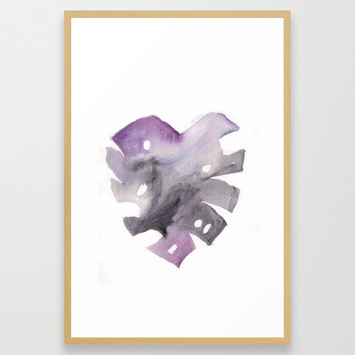 an abstract watercolor painting with purple and grey colors on white paper in a gold frame