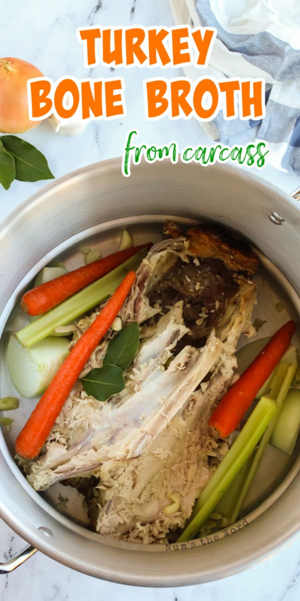 turkey bone broth in a pot with carrots and celery