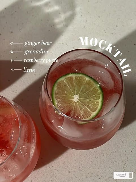 two glasses filled with watermelon and lime sitting next to each other