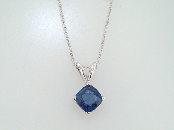 "HERE IS BEAUTIFUL CUSHION CUT CEYLON BLUE SAPPHIRE SOLITAIRE PENDANT NECKLACE 14 KARAT WHITE GOLD AVAILABLE YELLOW OR ROSE GOLD TOO ASK ME PLEASE COMES WITH 16\" OR 18\" INCH CHAIN CENTER CUSHION CUT CEYLON BLUE SAPPHIRE VERY SWEET LIGHT BLUE COLOR & CLEAN SAPPHIRE !! CENTER SHAPE- CUSHION CUT CUT- VERY GOOD CLARITY- AA COLOR- BLUE CARAT- 1.16ct MEASUREMENT- 5.95 X 5.90 mm TOTAL 1.16 CARAT RETAIL PRICE IS OVER $2,800.00 COMES WITH $2,250.00 CERTIFIED APPRAISAL !! DREAM IT I\"LL MAKE IT SPEC Luxury Blue Diamond-cut Necklace, Elegant Blue Hallmarked Necklace, Formal Hallmarked Blue Necklaces, Formal Blue Hallmarked Necklaces, Formal Blue Hallmarked Necklace, Hallmarked Sapphire Necklace, Classic Tanzanite Necklaces With Diamond Cut, Classic Tanzanite Necklace With Diamond Cut, Classic Blue Sapphire Necklace