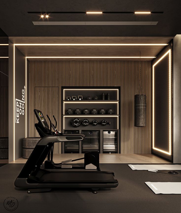 an empty gym with treadmills and exercise equipment in the center, illuminated by recessed lighting