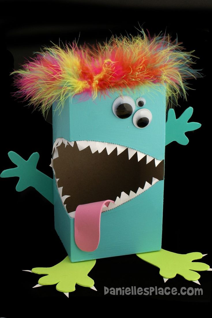 a box with a monster's head sticking out of it and the words monster valentine box