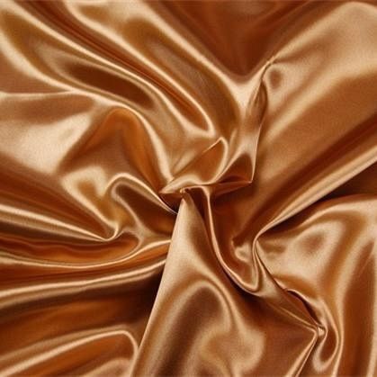 a close up view of a brown satin fabric