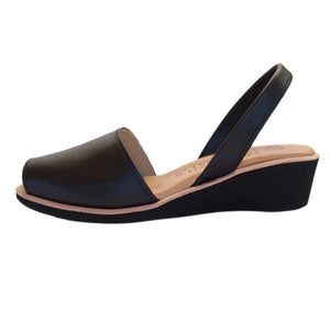 Introducing our comfiest midi wedges: a 1.75 inch wedge, a padded insole and a slightly larger toe area make for a very comfortable shoe Upper and insole made of leather, outsole made of rubber Fit: true to size to slightly large; size down if in between sizes Made in Spain Free shipping (4-6 business days) Comfortable Wedge Sandals With Removable Insole And Round Toe, Comfortable Wedge Sandals With Rubber Sole And Round Toe, Comfortable Wedge Sandals With Rubber Sole, Comfortable Slip-on Wedge Sandals With Ortholite Insole, Leather Wedge Sandals With Arch Support And Low Heel, Low Heel Leather Wedge Sandals With Arch Support, Casual Wedge Sandals With Round Toe And Leather Sole, Casual Wedge Sandals With Leather Sole And Round Toe, Leather Low Heel Wedge Sandals With Arch Support