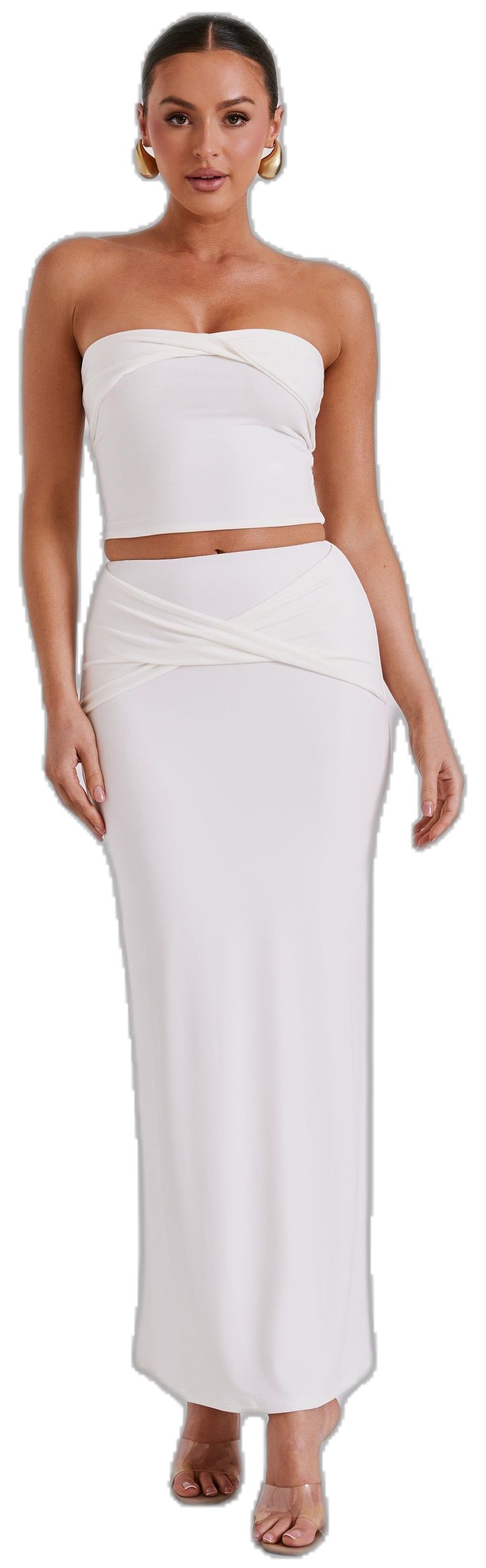 In a twist. The CERI is a delicate slinky top, crafted from smooth stretch MESHKI blend fabric. When worn, it creates a figure-hugging silhouette, enhancing your natural shape and contours. With its cropped length and twist panel feature. Elevate the look by pairing with the Ceri Maxi Twist Skirt. Elegant Seamless Fitted Bottoms, Elegant Fitted Seamless Bottoms, Elegant Seamless Stretch Crop Top, Elegant Stretch Seamless Crop Top, Elegant Seamless Crop Top, Elegant Fitted Elastane Crop Top, Elegant Summer Elastane Crop Top, Elegant Ruched Stretch Crop Top, Elegant Ruched Crop Top