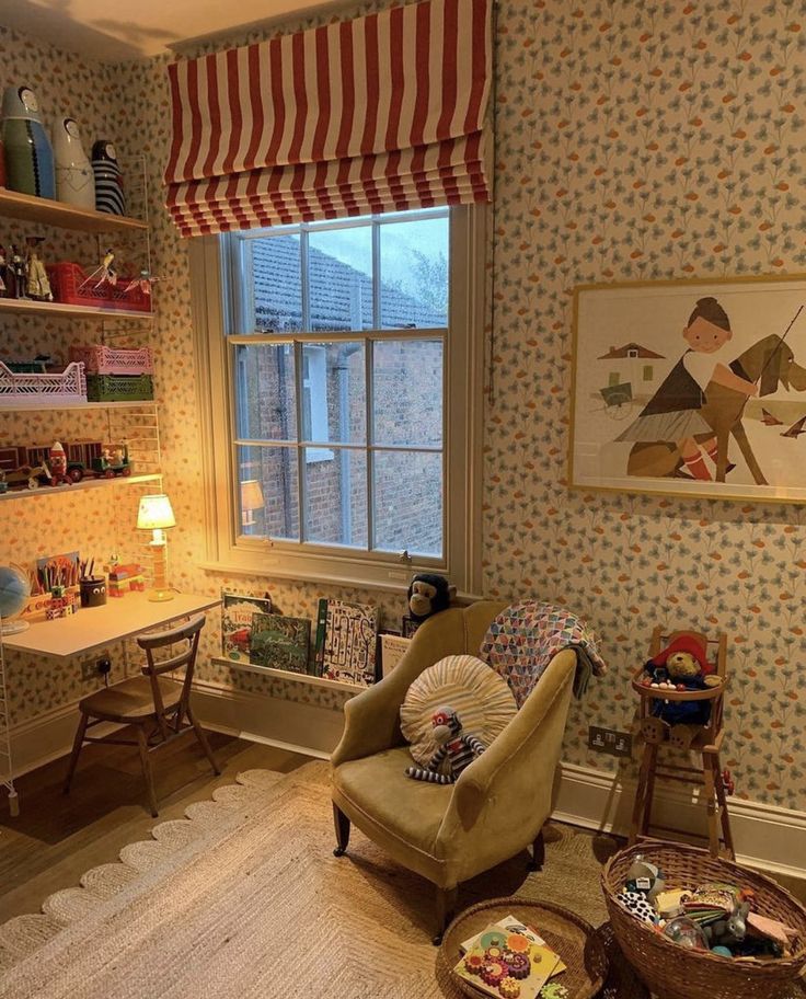 a child's room with toys and decor on the walls, including a rocking chair