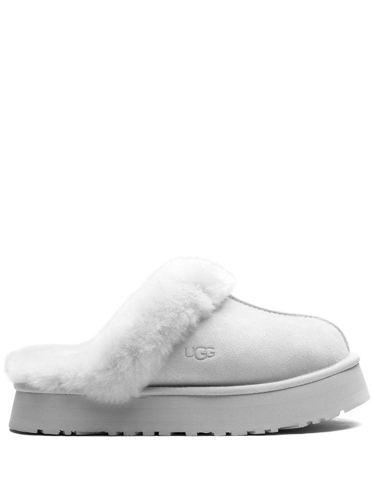 "Find UGG Disquette \"\"goose\"\" Slippers on Editorialist. light grey sheepskin/suede shearling lining embossed logo to the side round toe platform sole These styles are supplied by a premium and authenticated sneaker marketplace. Stocking only the most sought-after footwear, they source and curate some of the most hard to find sneakers from around the world." Goose Slippers, Ball Shoes Heels, White Ugg Slippers, White Uggs, Dunks Sneakers, Grey Uggs, Countdown Gifts, Ugg Slides, Big Closet