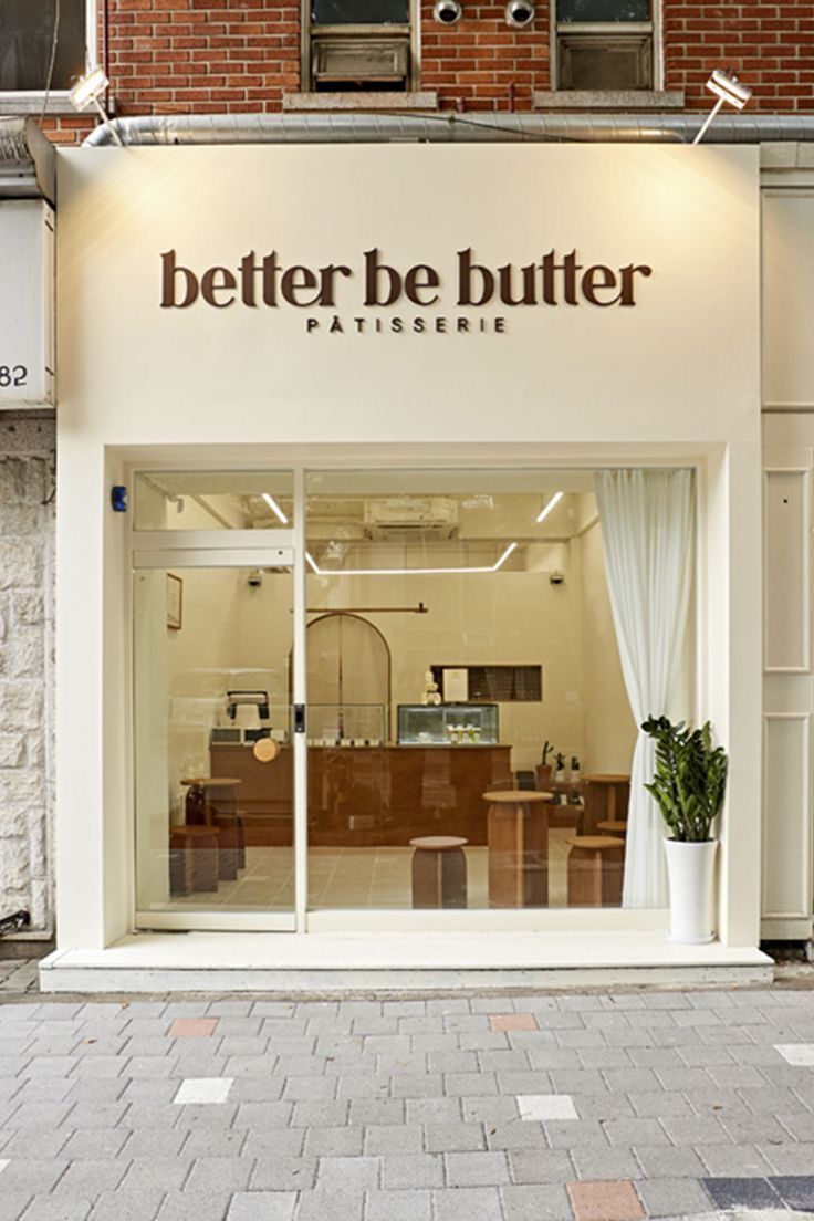 the outside of a building with a sign that says better be butter