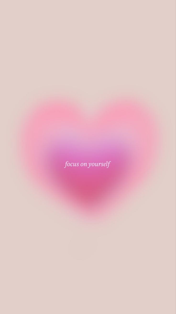 a pink heart with the words focus on yourself