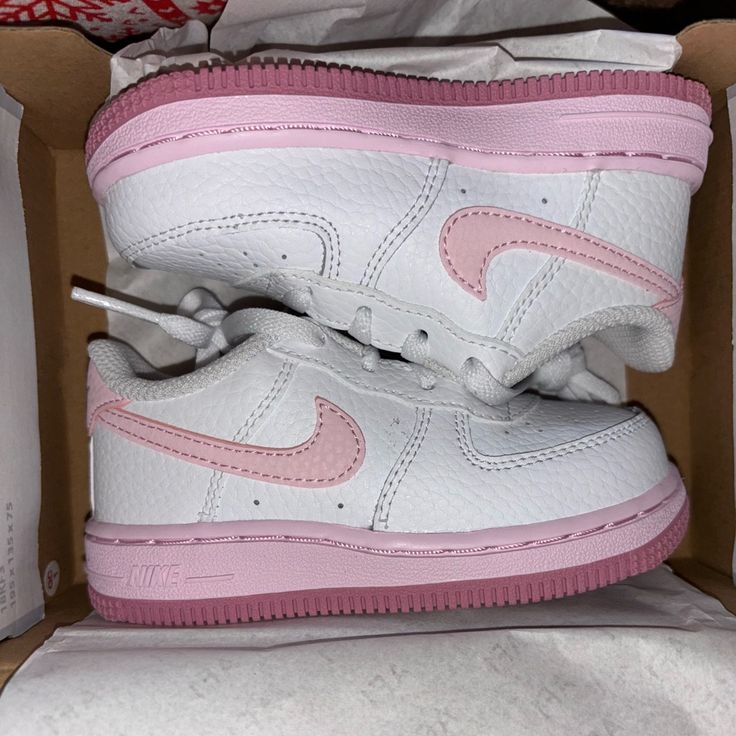 Brand New In Bow Never Worn Nike Force 1 White/Pink Toddler 7c Cute White Sneakers With Rubber Sole, Cute Pink Sneakers For Streetwear, Cute Pink Low-top Sneakers, Pink Synthetic Sneakers For School, Pink Low-top Sneakers For School, Pink Sports Sneakers With Soft Sole, Pink Sneakers With Soft Sole For Sports, Pink Non-slip Sneakers For Streetwear, Pink High-top Sneakers For School