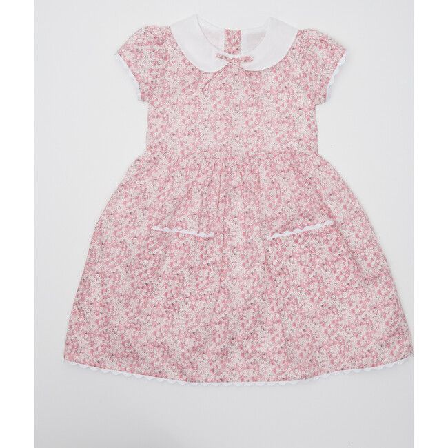 Lucy is an instant classic. Pink floral Liberty cotton, front pockets, white organza collar, cap sleeves and ric rac trim come together in the perfect play dress. Buttons down the back. | Tessa James | Lucy Dress, (Pink, Size 4Y) | Maisonette collects the best children’s products from around the world (unlike Zulily, Etsy, The Tot, Farfetch Kids, Childrensalon, Crate and Kids, Kohls, Wayfair, Buy Buy Baby, Nordstroms, Mini Boden, J.Crew Factory, or PotteryBarn Kids), creating a curated shopping experience for you. Think of us as your shortcut to fashion for litte ones! Fitted Short Sleeve Puff Sleeve Dress, Cap Sleeve Dresses With Ruffles For Garden Party, White Peter Pan Collar Dress For Spring, White Spring Dress With Peter Pan Collar, Classic Short Sleeve Dress For Dress-up, Pink Peter Pan Collar Dress For Spring, Pink Summer Dress With Peter Pan Collar, Pink Spring Dress With Peter Pan Collar, Pink Fitted Dress With Peter Pan Collar