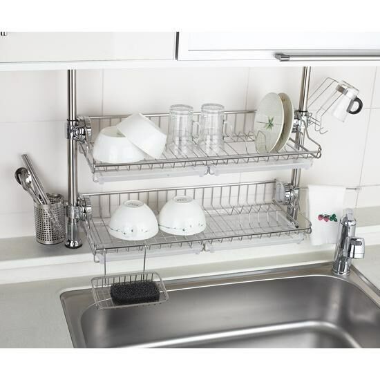 a kitchen sink with two shelves above it, and the measurements for each shelf below