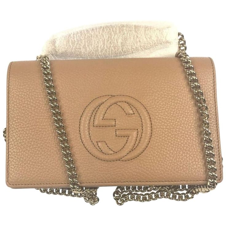 This Gucci Soho Wallet With Removable Chain In Camel Has A Textured Leather Exterior And Gold Snap Closure. It Features The Classic Gucci Gg Soho Logo On Front. Also Includes A Detachable Gold Chain Strap 22" Drop. Gucci Soho Wallet With Removable Chain In Camel Front Slip Pocket Interior Zipper Pocket 6 Card Slots Detachable Gold Chain Strap With 22" Drop Full Length Open Compartment With Slip Pocket Measurements: 8" L X 5" H X 2" D Product Number 598211 Made In Italy Gucci Leather Wallet On Chain, Gucci Leather Wallet On Chain For Everyday Use, Gucci Leather Wallet On Chain For Formal Occasions, Gucci Leather Wallet On Chain For Formal Use, Designer Gucci Leather Wallet On Chain, Classic Gucci Leather Wallet On Chain, Gucci Gold Wallet On Chain With Chain Strap, Gucci Gold Wallet On Chain With Gold-tone Hardware, Designer Brown Wallet On Chain With Chain Strap